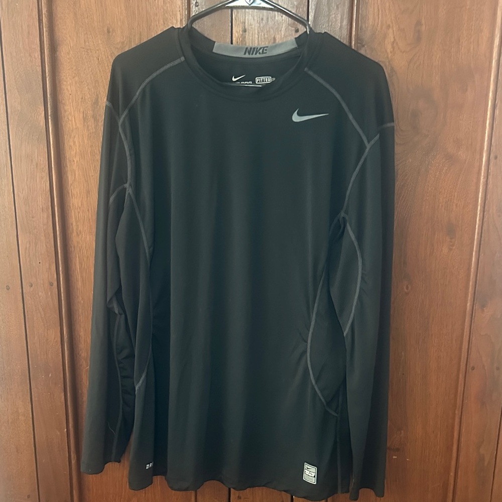 Nike Black Long-Sleeve Pro Combat Top with Light Gray Logo Patch